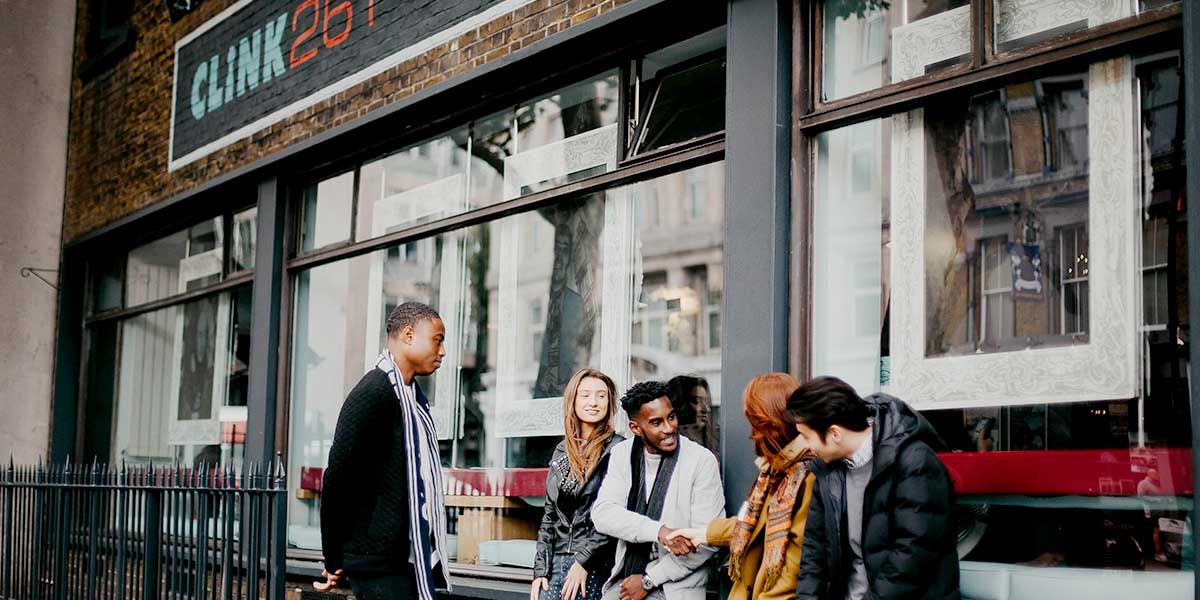 Friends gathers in front of Clink261 hostel in London