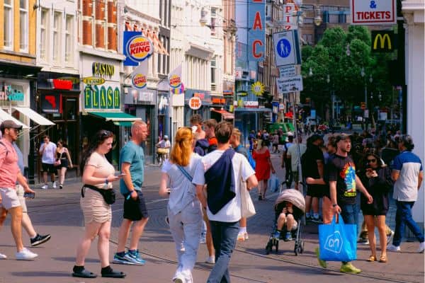 people walking in amsterdam city cente
