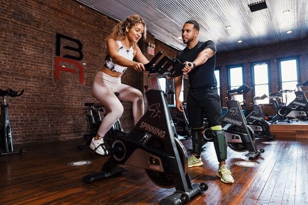 Man and woman working out in a gym