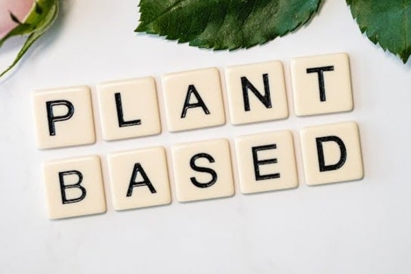 Scrabble letters spelling plant based