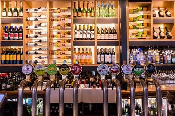 Beer taps with alcohol display in the back