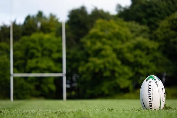 Rugby ball and goal posts