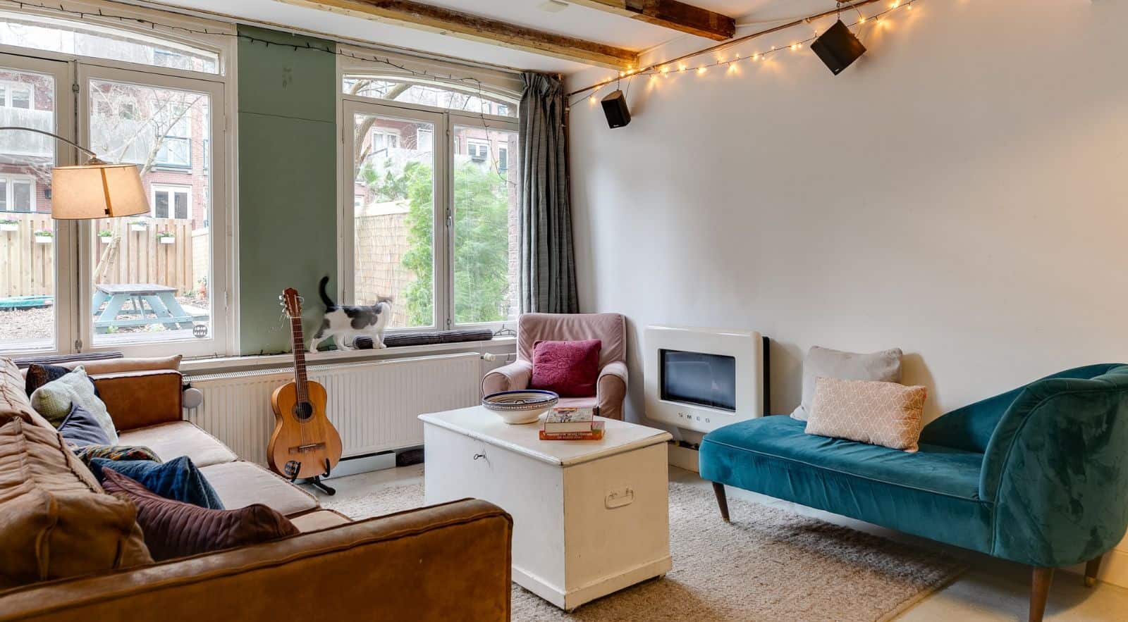 living room at clink coco hostel in amsterdam