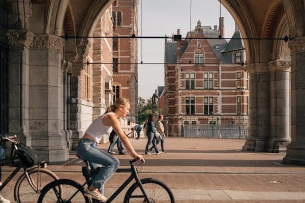 Woman cycling in Amsterdam