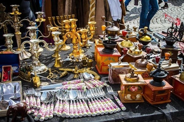 antique pieces at a flea market stall
