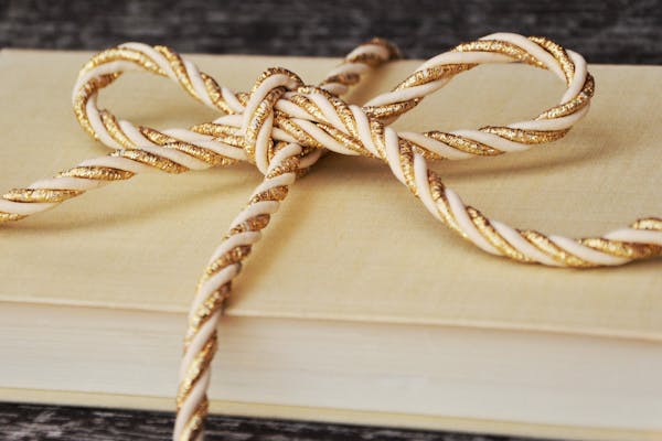 golden bow on a book