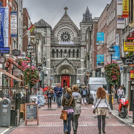 Annes Street just beside Dublin's Grafton Street, with tourists and famous bars like Kehoes