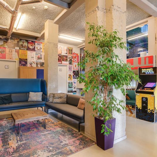 a social space at ClinkNOORD hostel in Amsterdam